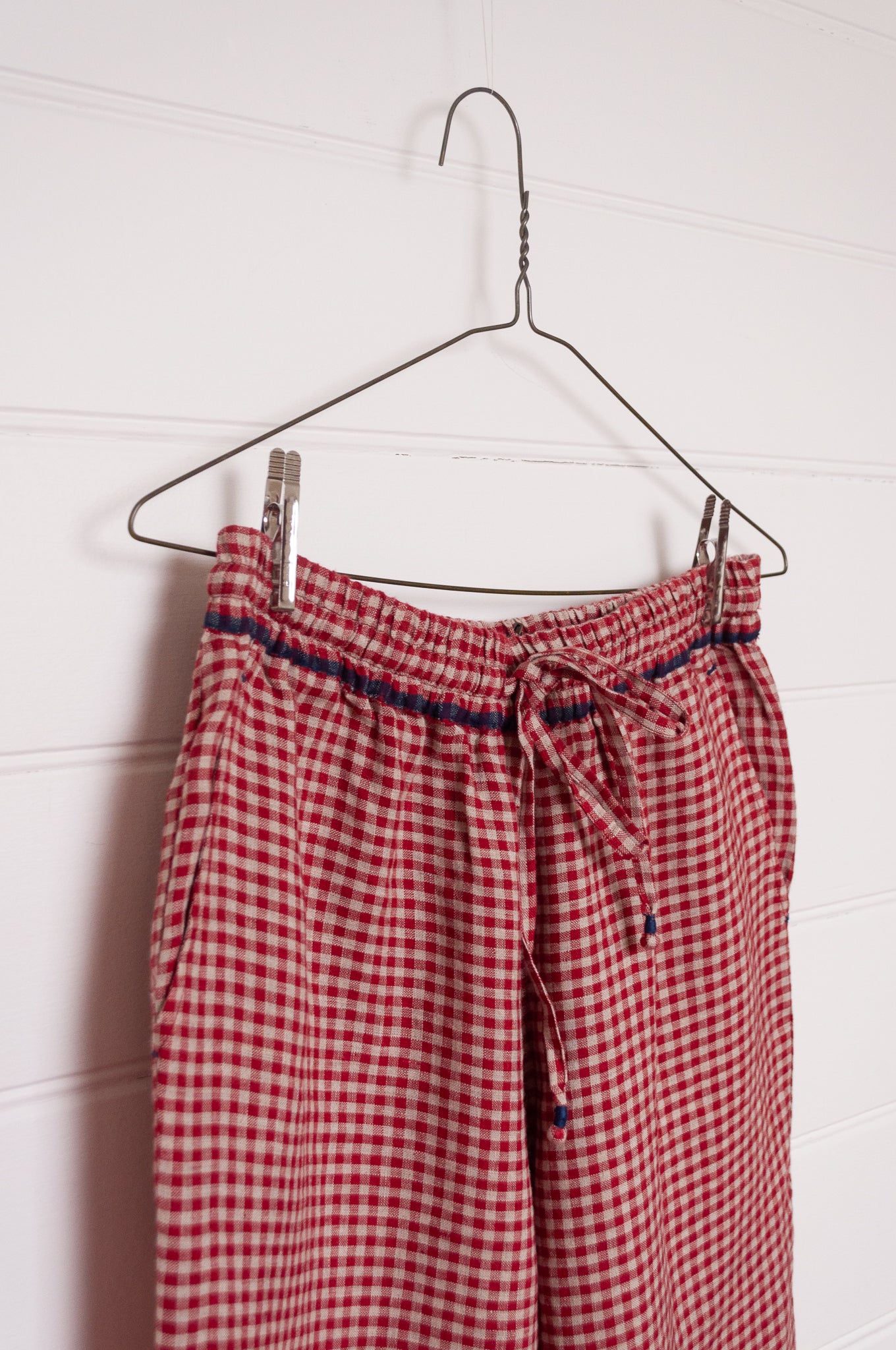 DVE Dityaa linen pants in crimson check.
