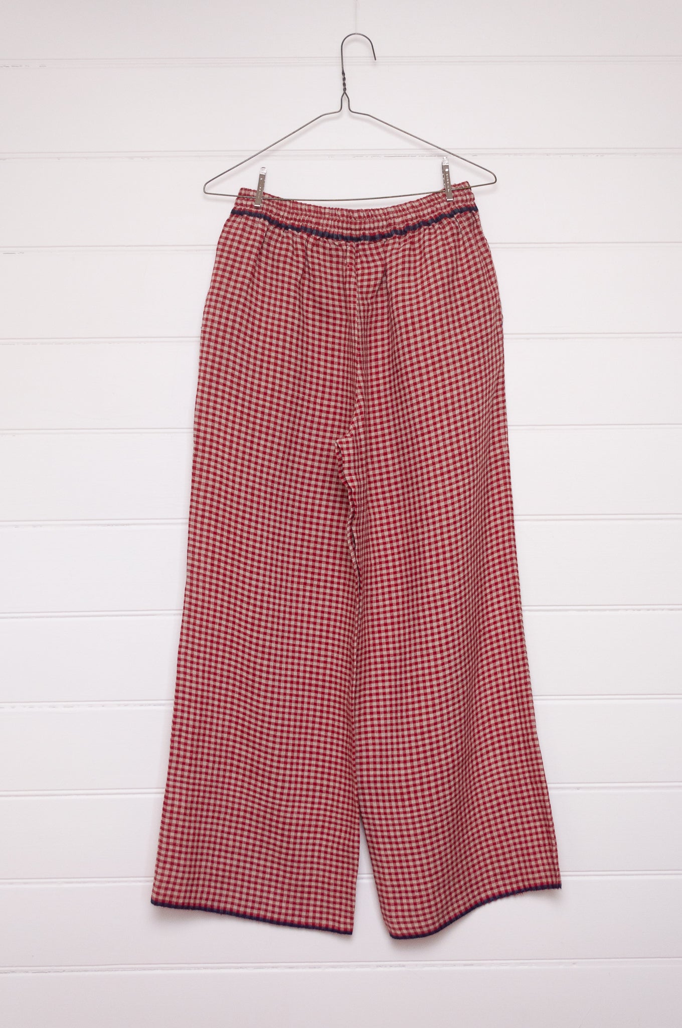 DVE Dityaa linen pants in crimson check.
