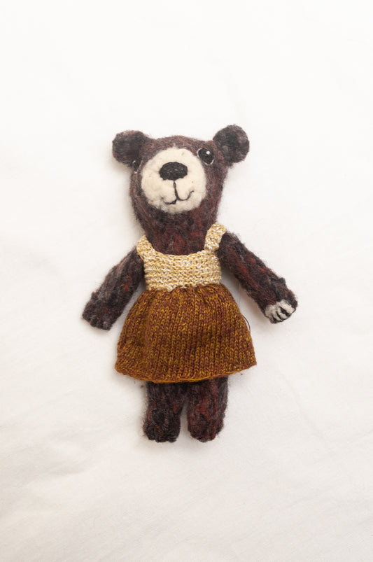 Sophie Digard poupee pure wool teddy bear in chocolate brown with brown and ecru dress.