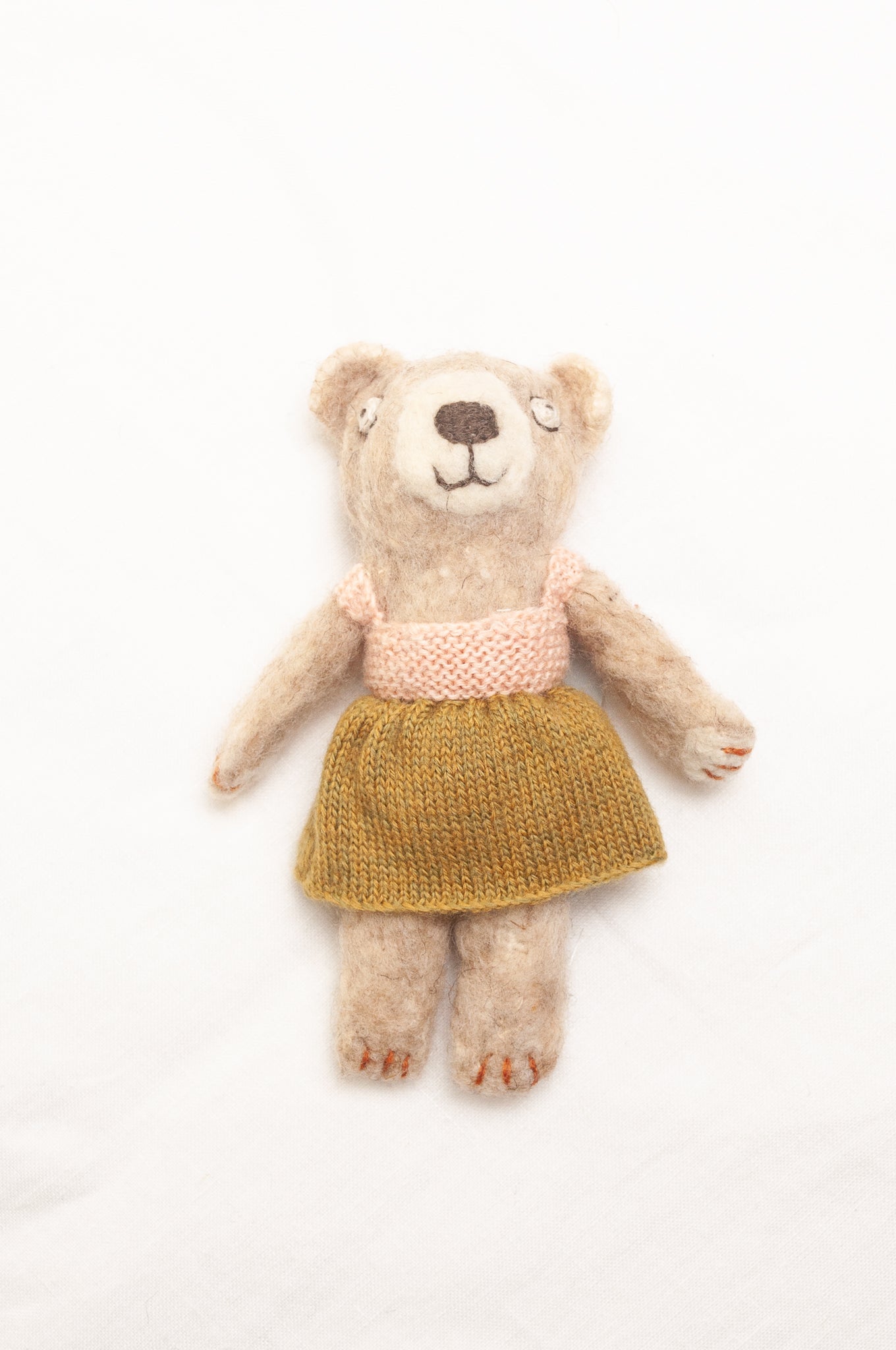 Sophie Digard poupee pure wool teddy bear in oatmeal with mustard and pink dress.