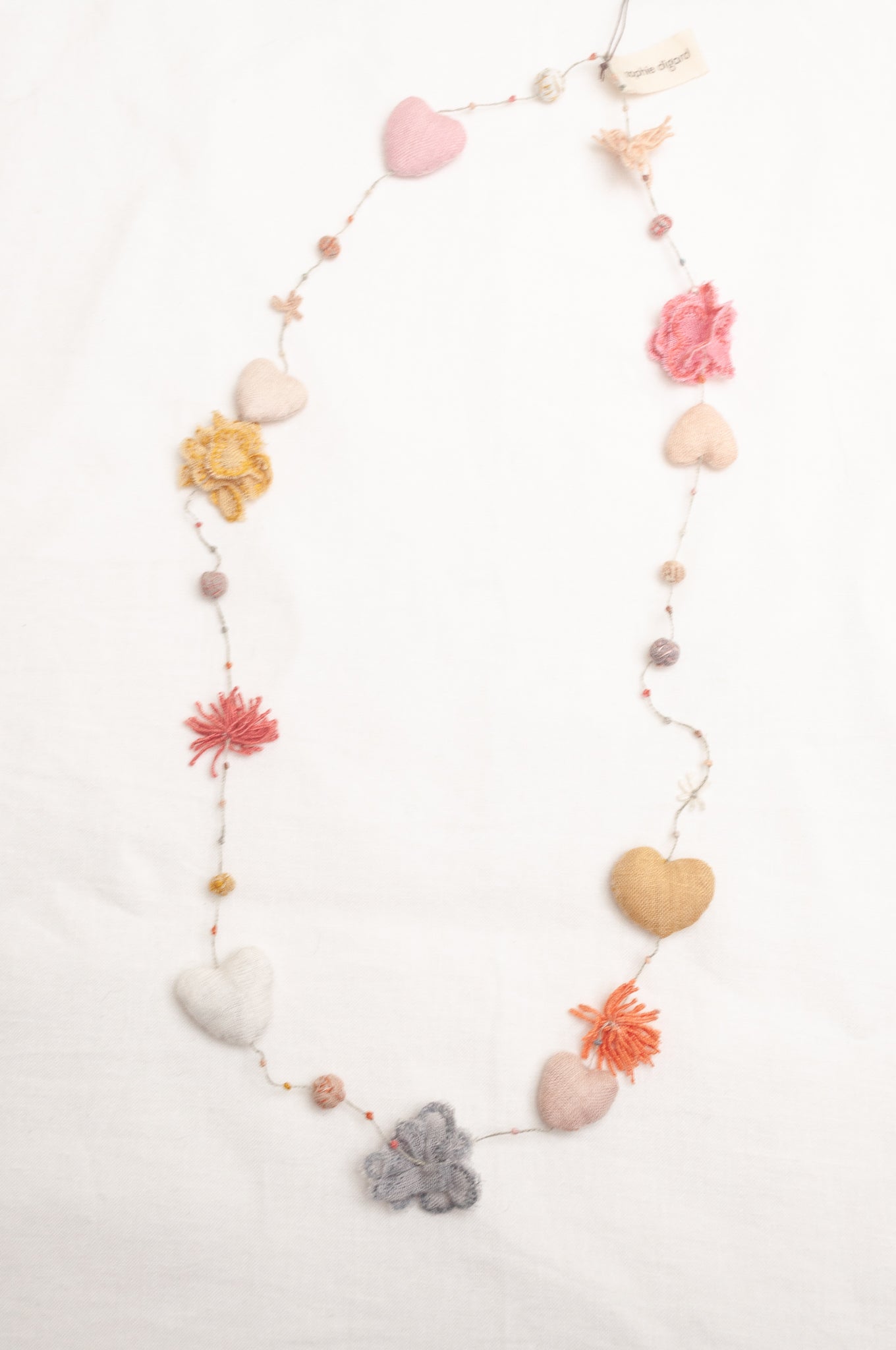 Sophie Digard hearts and flowers necklace.