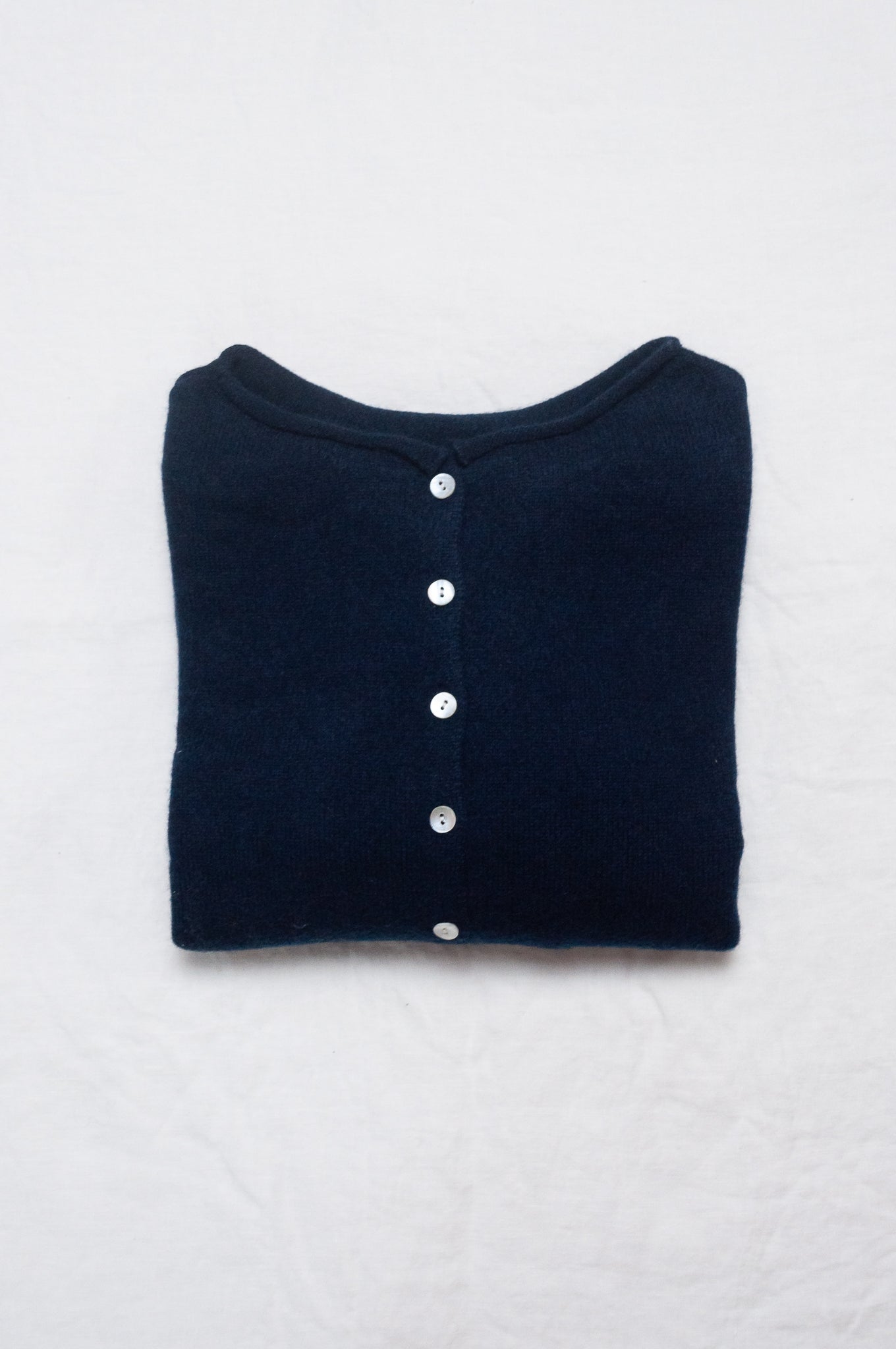 One size reversible cashmere cardigan in deep midnight navy blue.