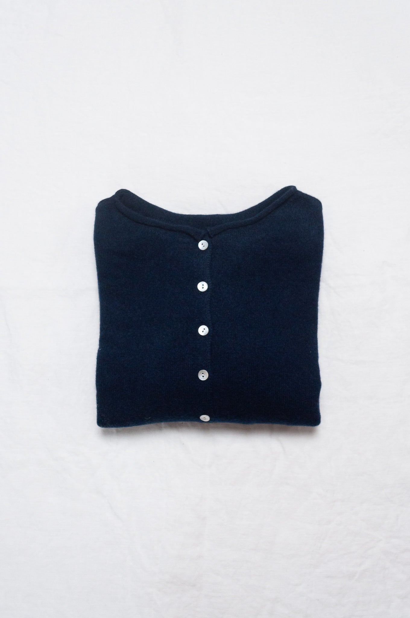 One size reversible cashmere cardigan in deep midnight navy blue.