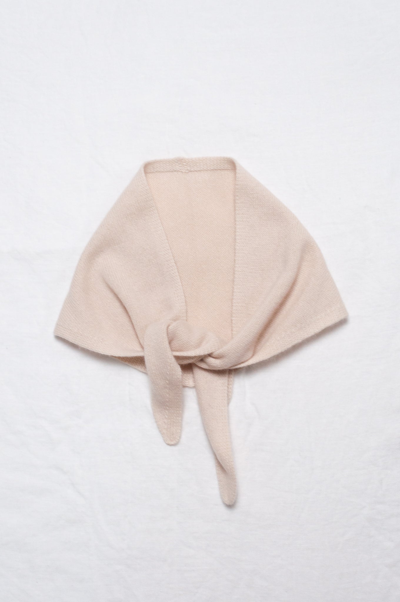 Cashmere triangle neck scarf in ecru cream.
