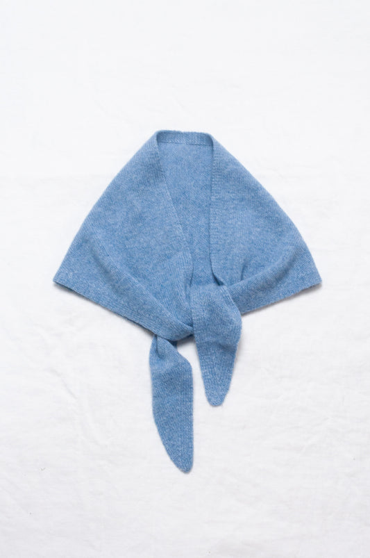Cashmere triangle neck scarf in sky blue.