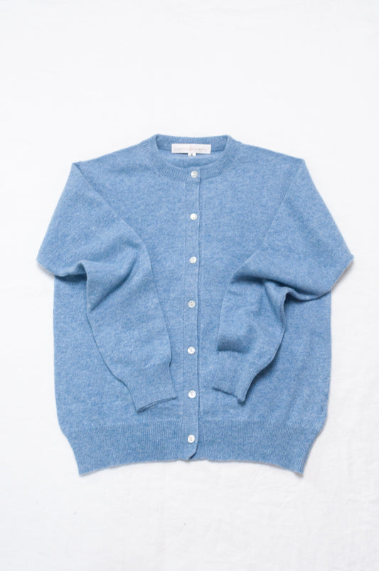 Juniper Hearth 100% cashmere button up crew neck cropped cardigan in sky blue.