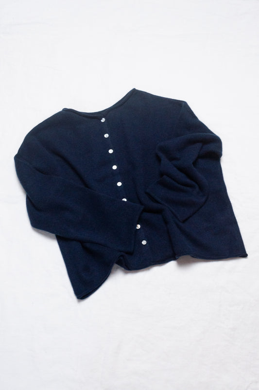 One size reversible cashmere cardigan in deep midnight navy blue.