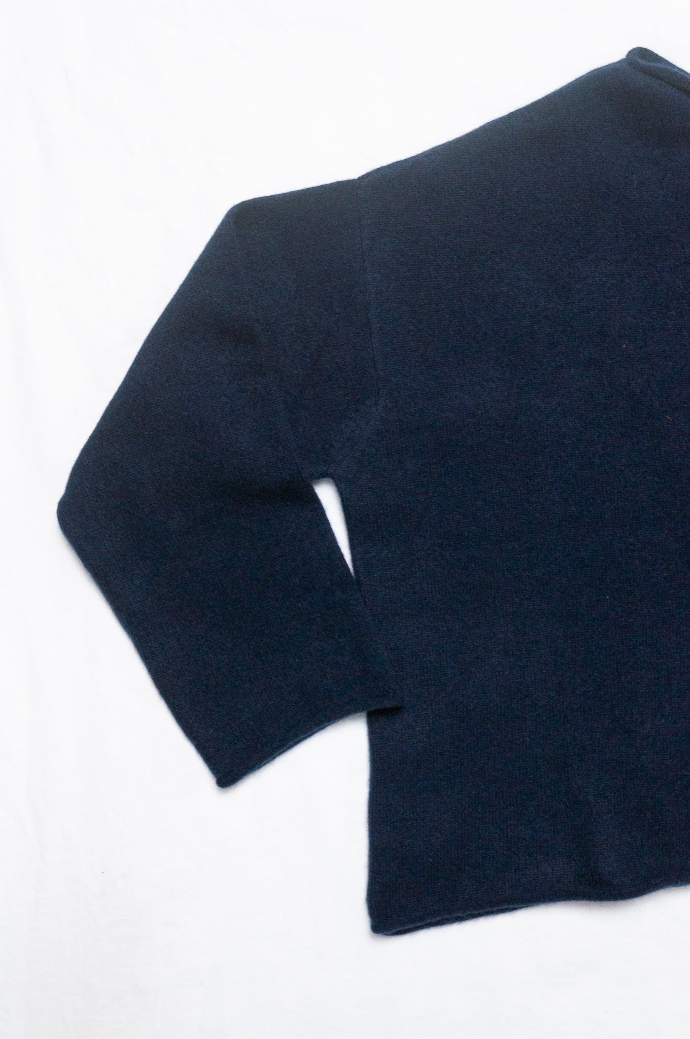 One size reversible cashmere cardigan in deep midnight navy blue.