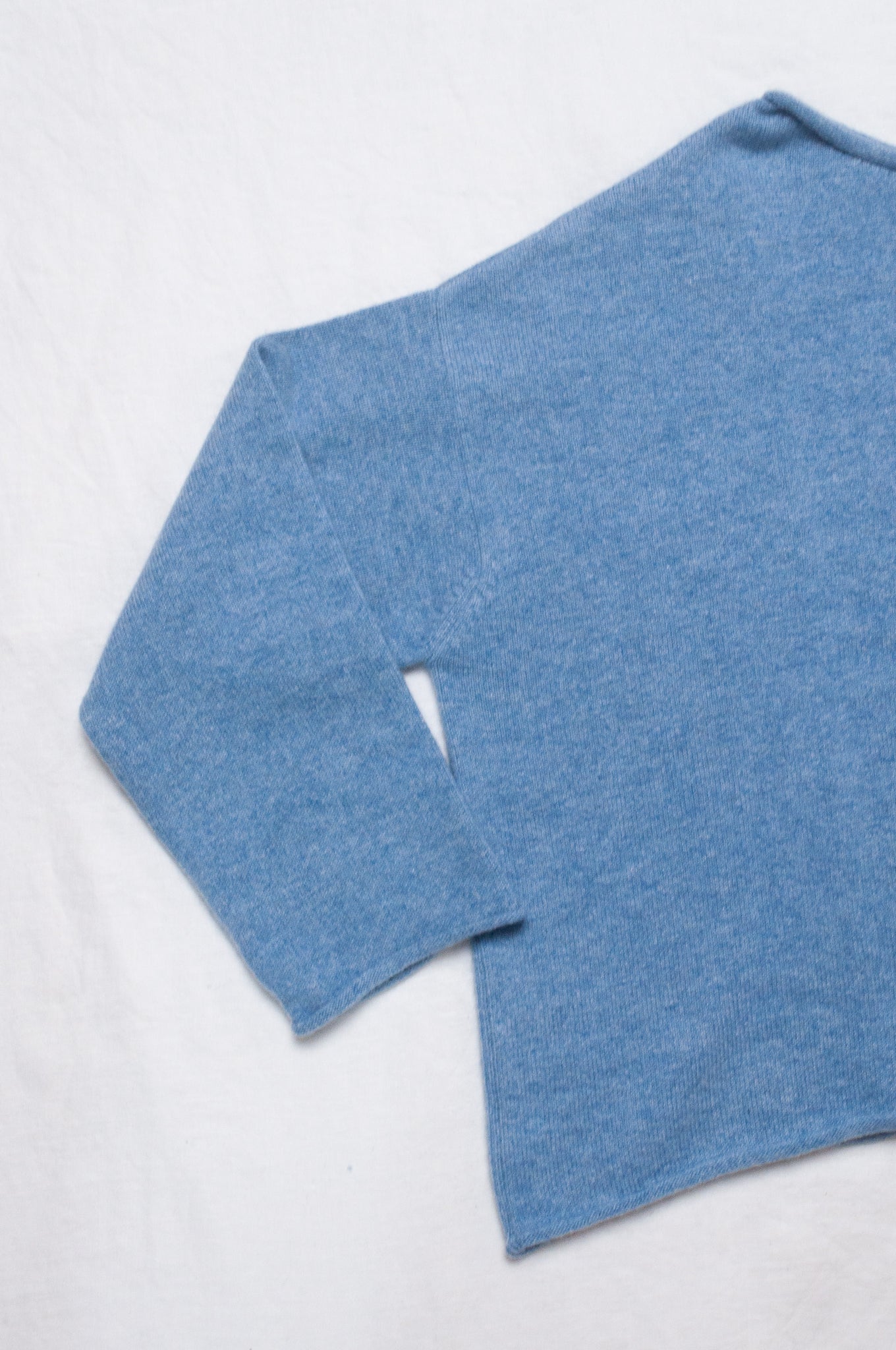 One size reversible cardigan ethically made in Nepal from 100% pure cashmere, in sky blue.