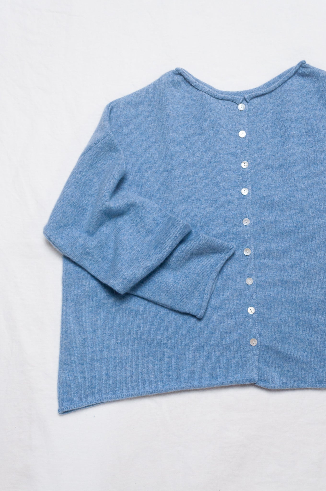 One size reversible cardigan ethically made in Nepal from 100% pure cashmere, in sky blue.