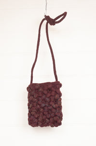 Sophie Digard hand crocheted small cross body wool bag in the Freesias design, Jasper Dingle colours deep russet brown and blue.