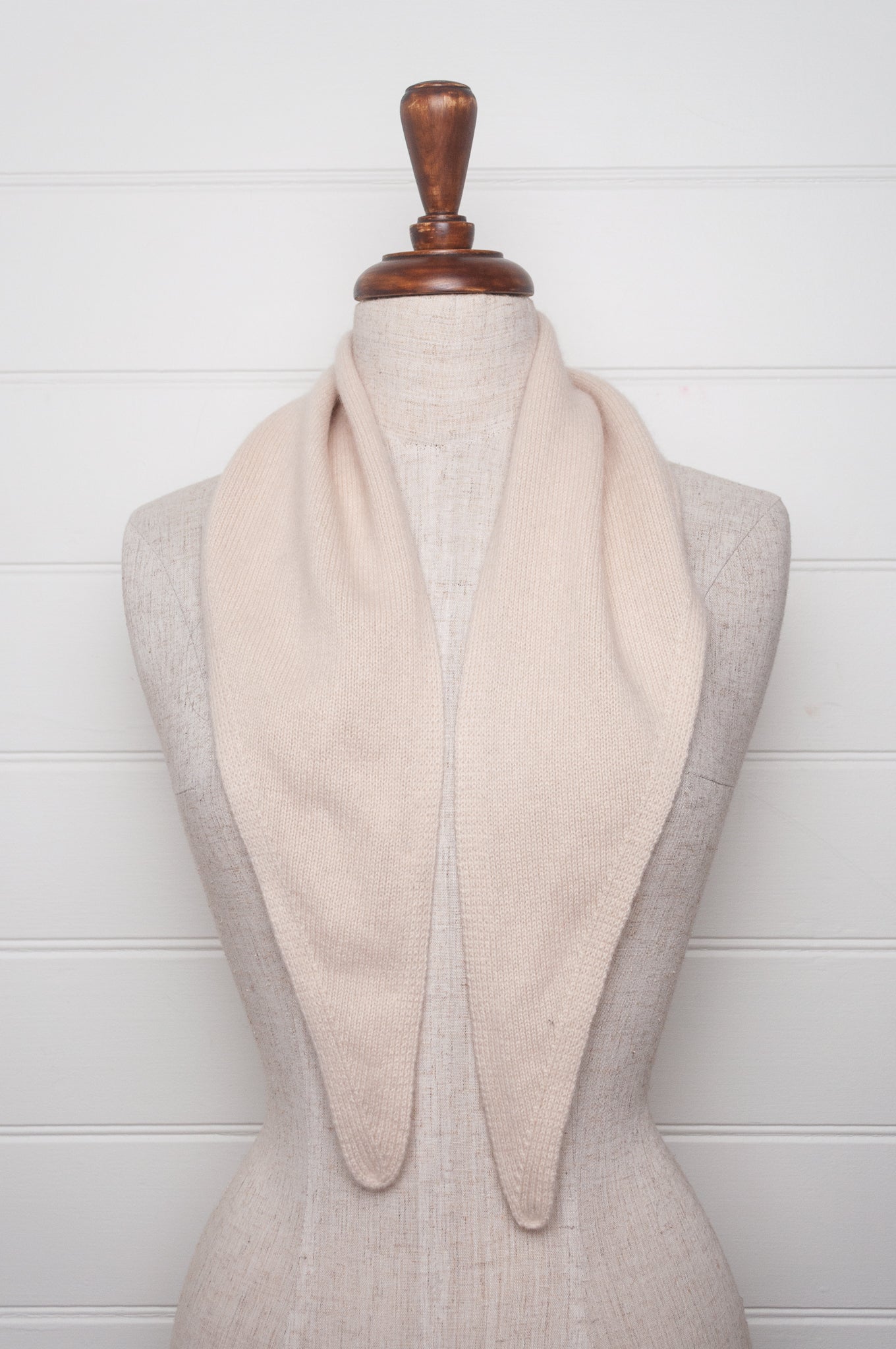 Cashmere triangle neck scarf in ecru cream.