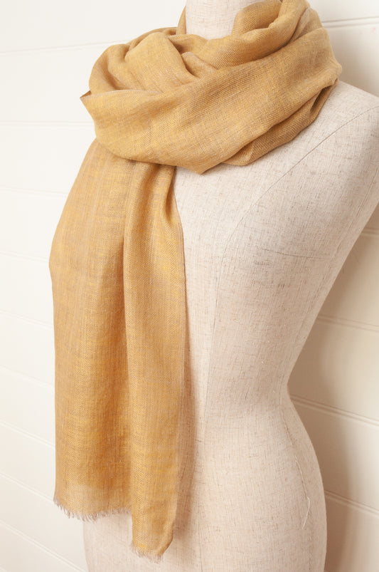 Pure pashmina cashmere wool handwoven scarf in soft gold.