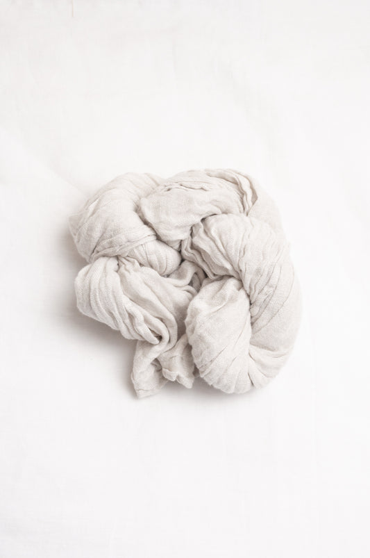 Linen scarf in soft light grey.