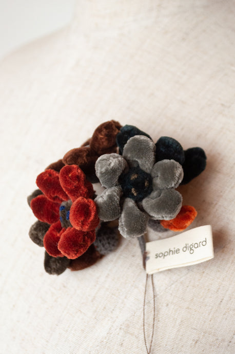 Classic handmade Sophie Digard jonquille flower brooch in autumn palette velvet.