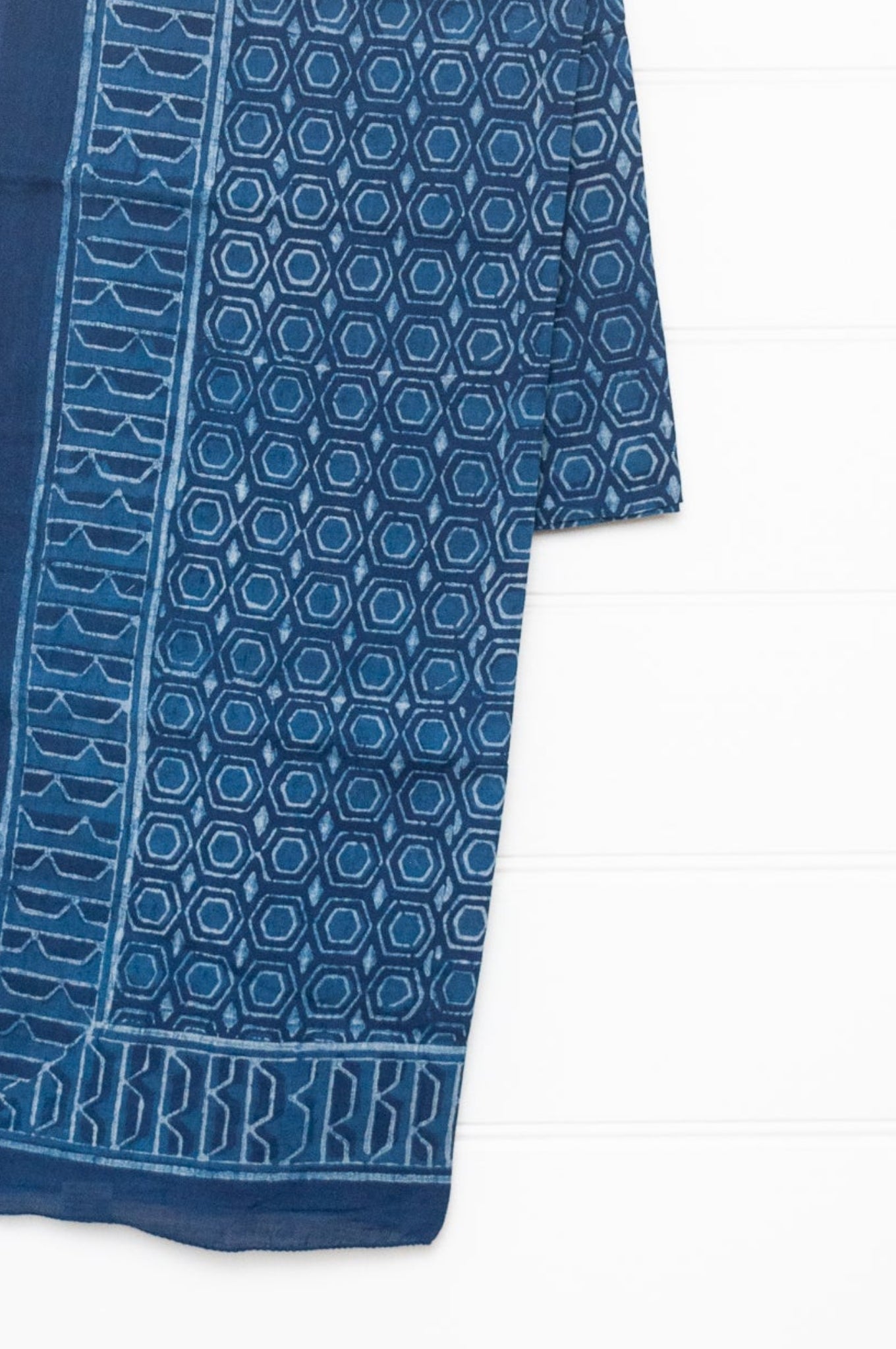 Shades of indigo blue blockprint cotton sarong with hexagon geometric design.