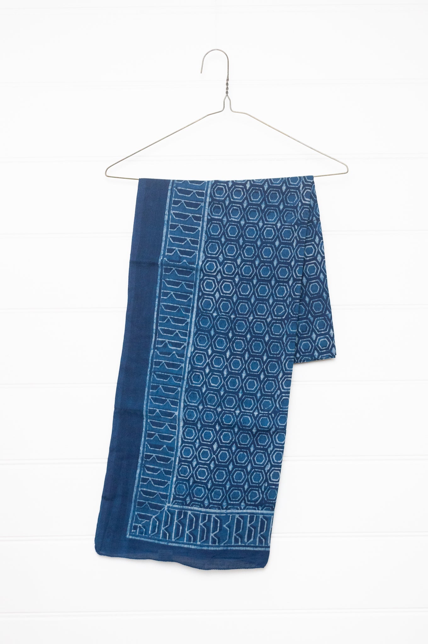 Shades of indigo blue blockprint cotton sarong with hexagon geometric design.