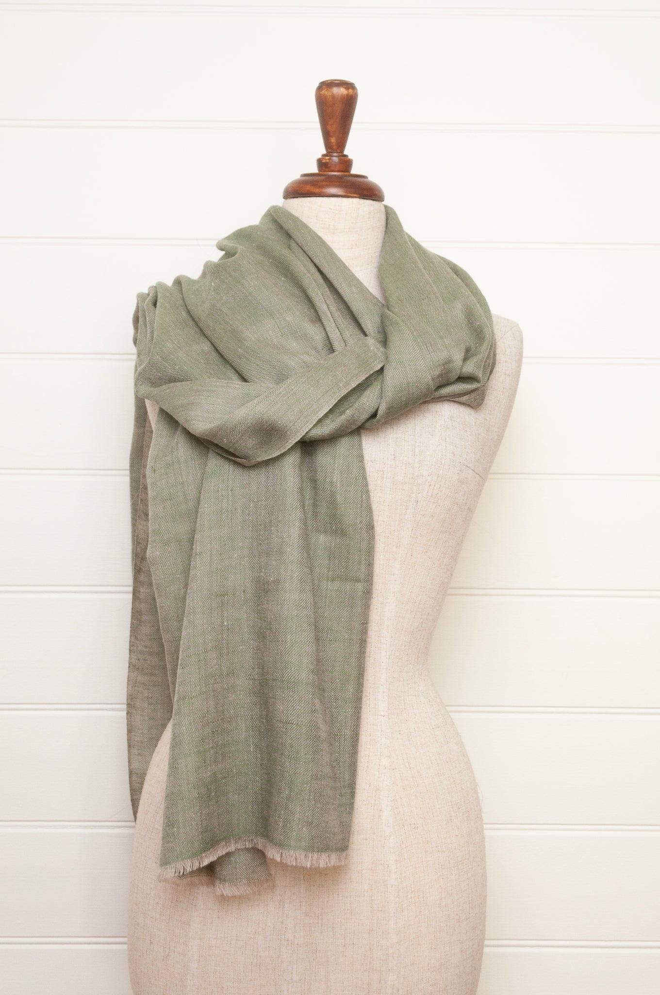 Pure pashmina cashmere wool handwoven scarf in soft sage green.