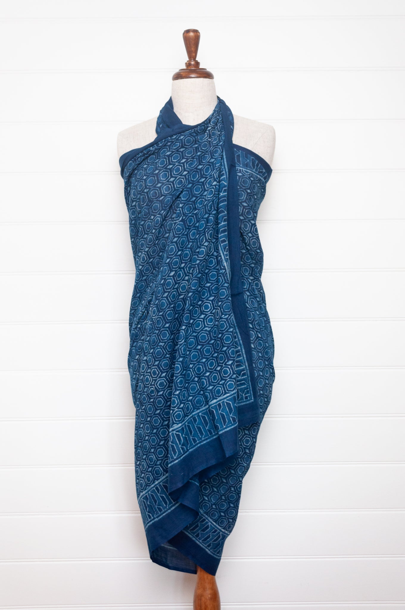 Shades of indigo blue blockprint cotton sarong with hexagon geometric design.