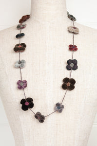Classic handmade Sophie Digard necklace is a string of beautiful velvet flowers, backed with linen embroidery in a cool winter palette, Dingle.