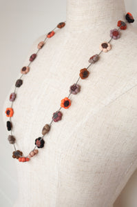 Sophie Digard handmade linen flower necklace in autumn palette.