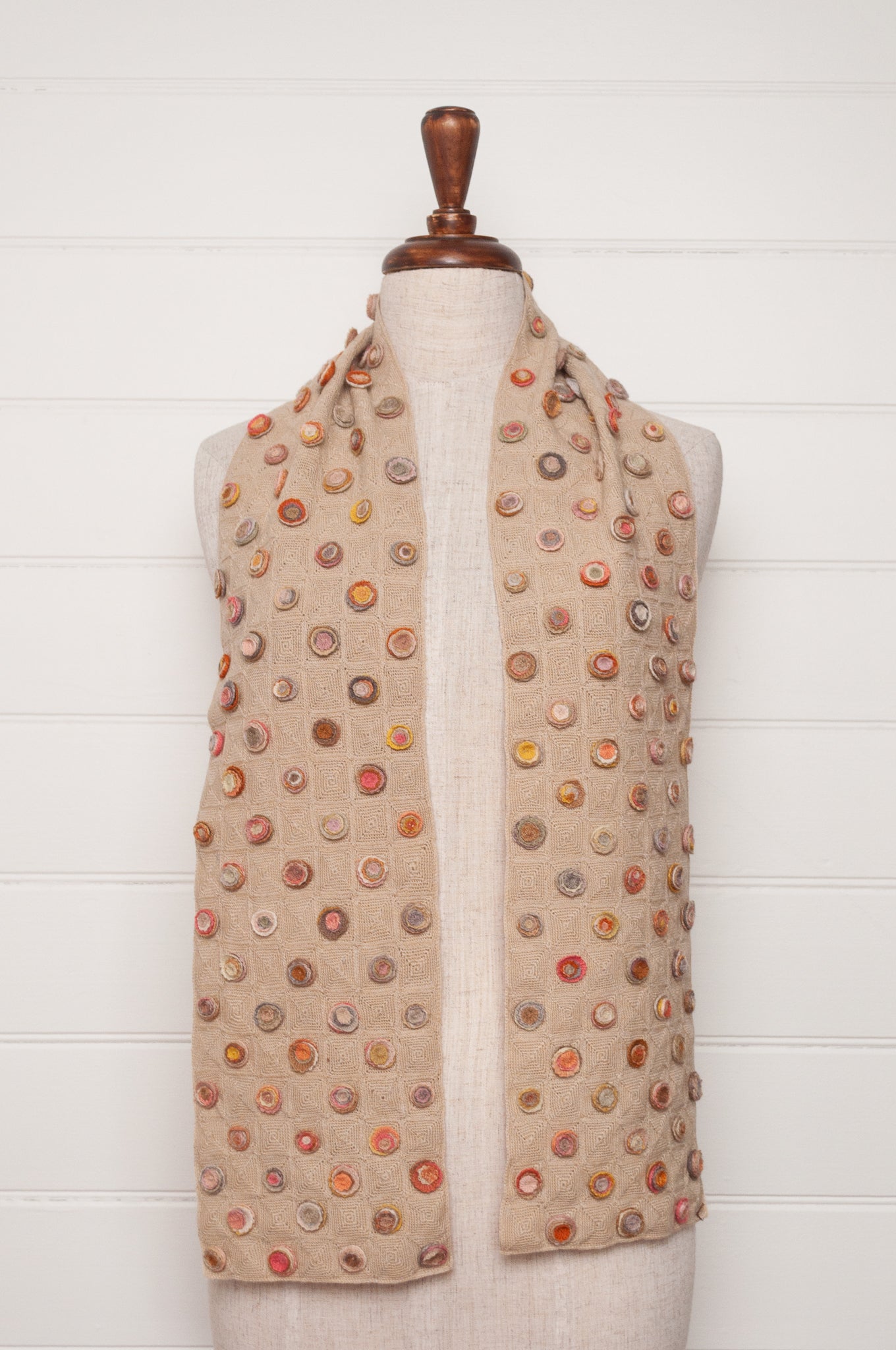 Sophie Digard crocehted scarf with warm toned small crocehted flower medallions on a neutral base.