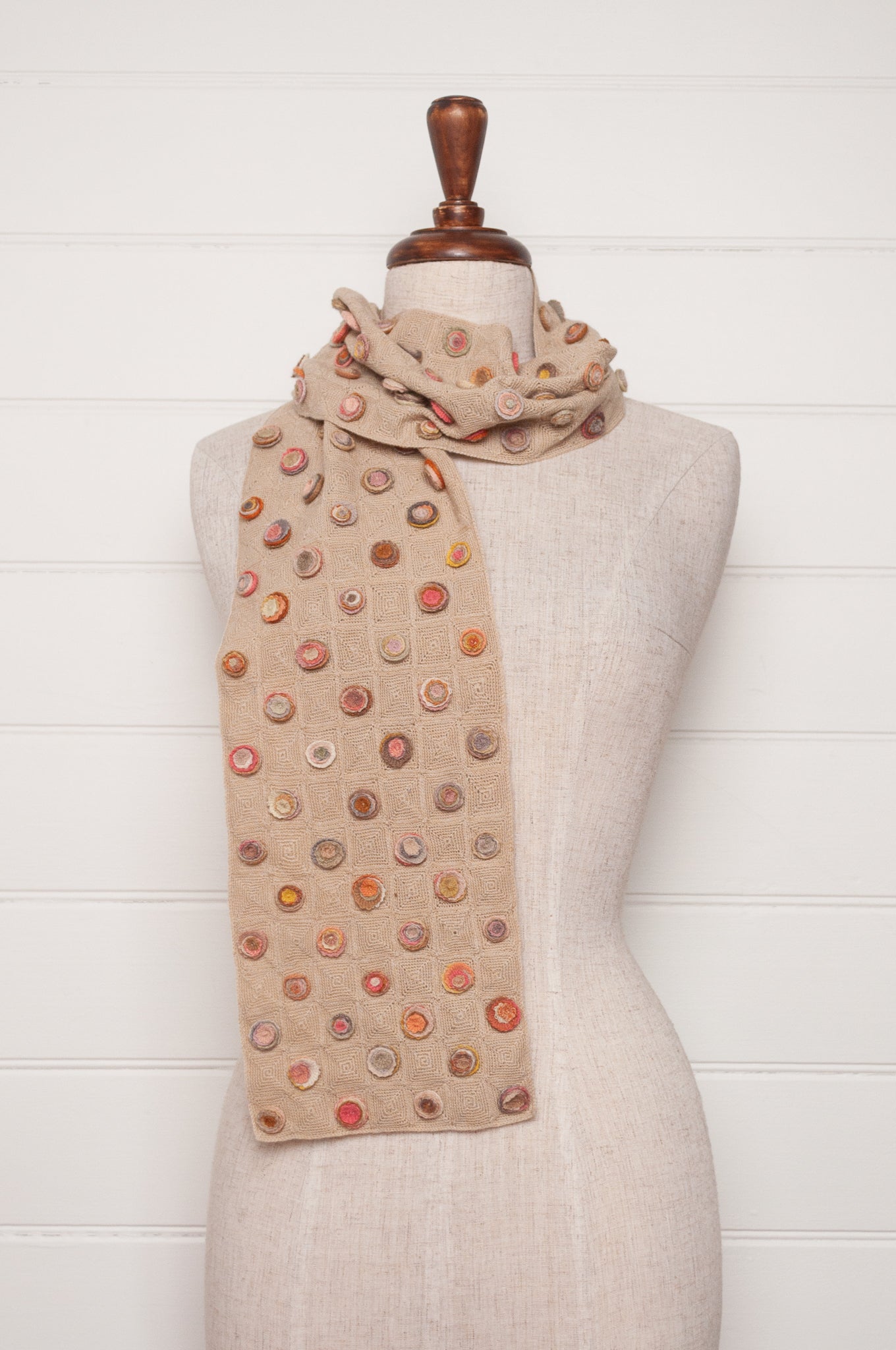 Sophie Digard crocehted scarf with warm toned small crocehted flower medallions on a neutral base.