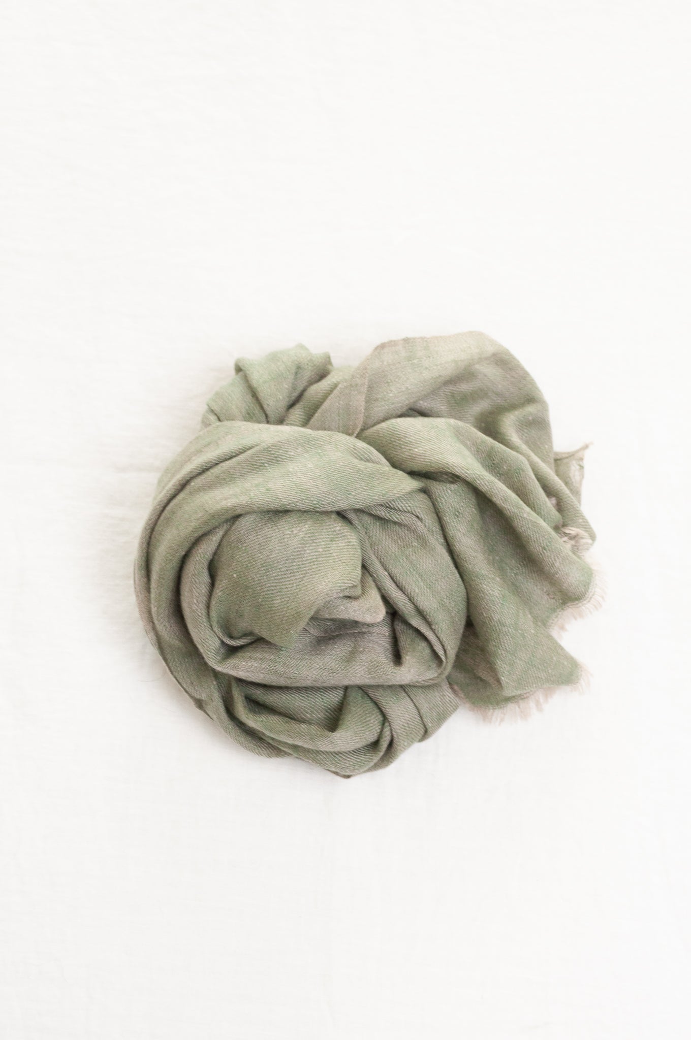 Pure pashmina cashmere wool handwoven scarf in soft sage green.