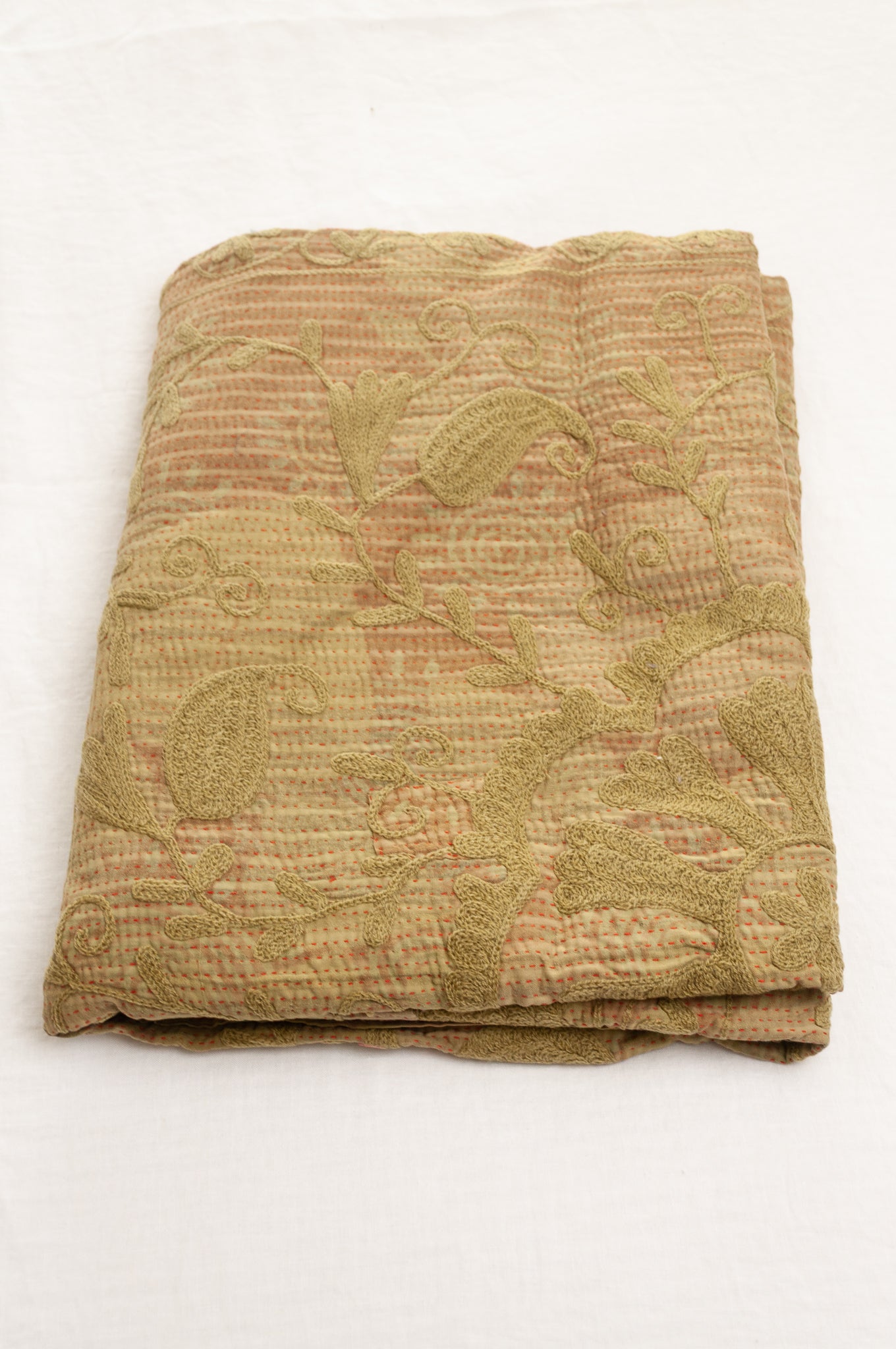Vintage kantha quilt embroidered Suzani style floral design in olive on mustard stripes.