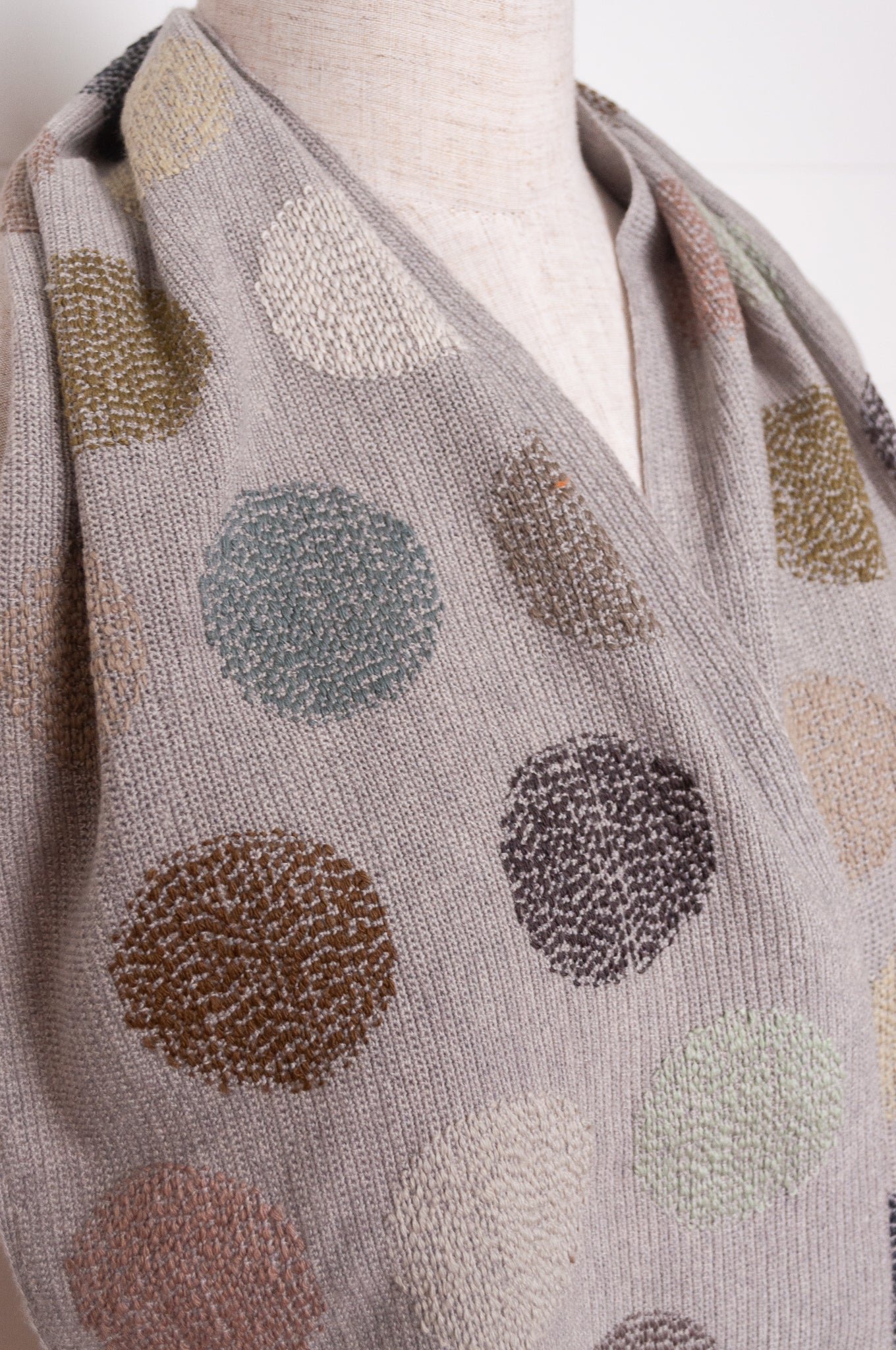 Sophie Digard fine crochet scarf in warm grey with neutral coloured embroidered spots.