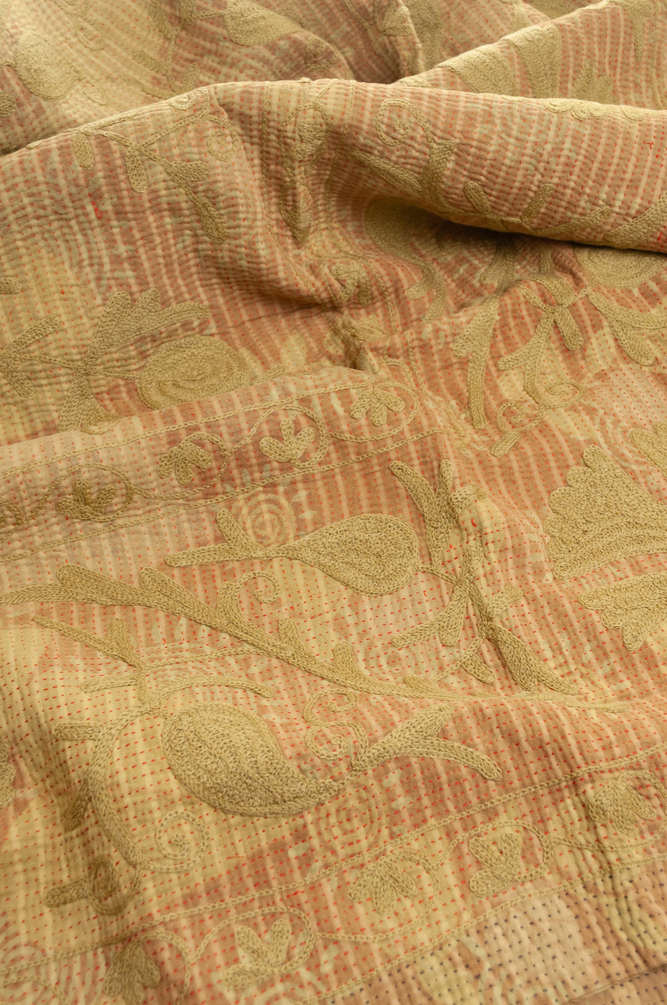 Vintage kantha quilt embroidered Suzani style floral design in olive on mustard stripes.
