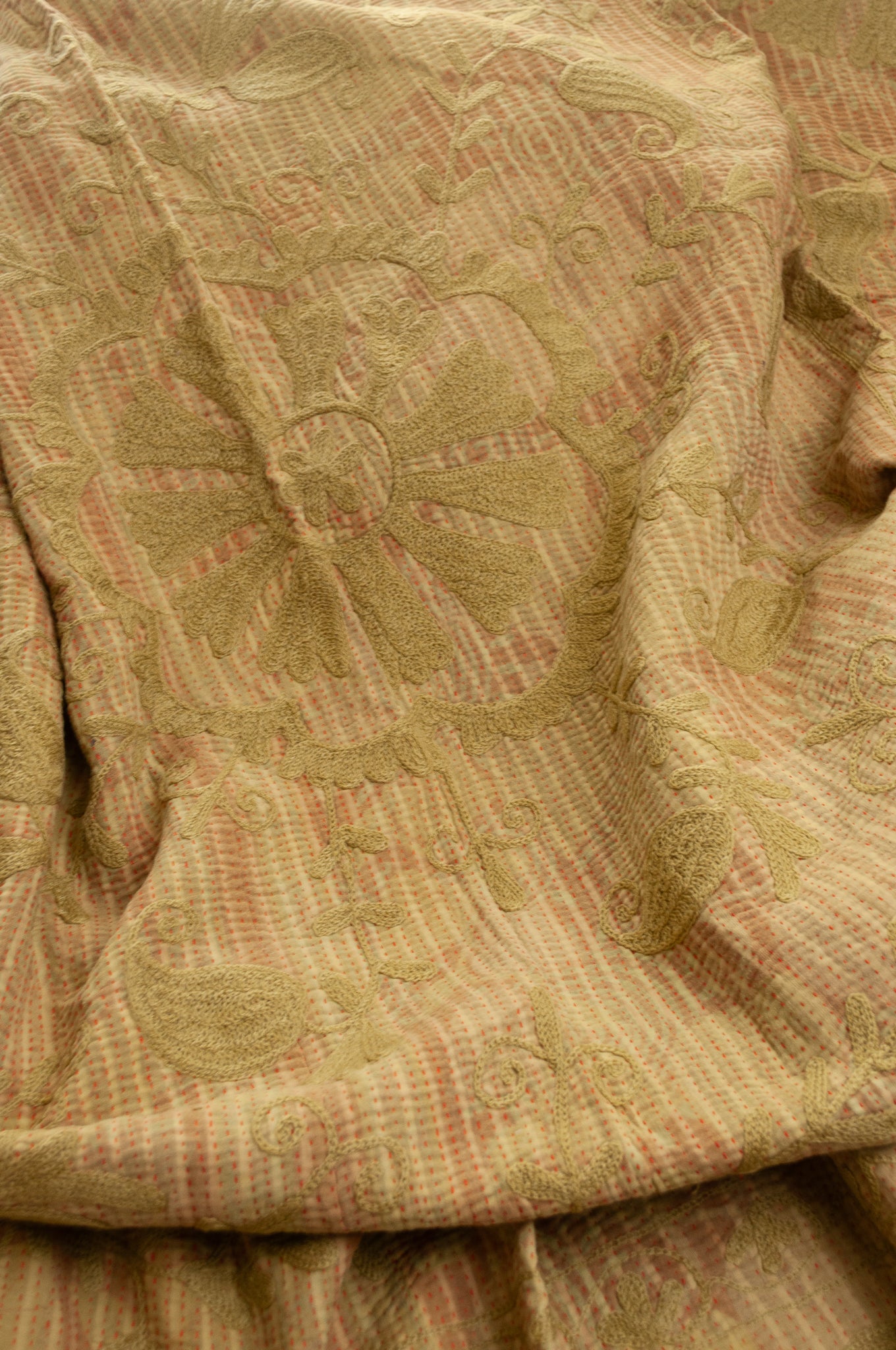 Vintage kantha quilt embroidered Suzani style floral design in olive on mustard stripes.