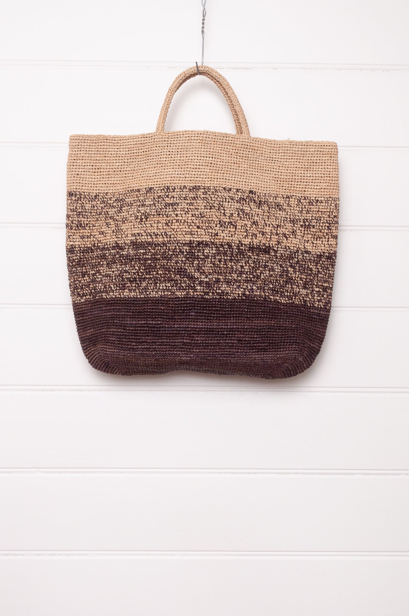 Sophie Digard crochet raffia shopper tote bag in gradient stripes from dark mole brown to natural flax.