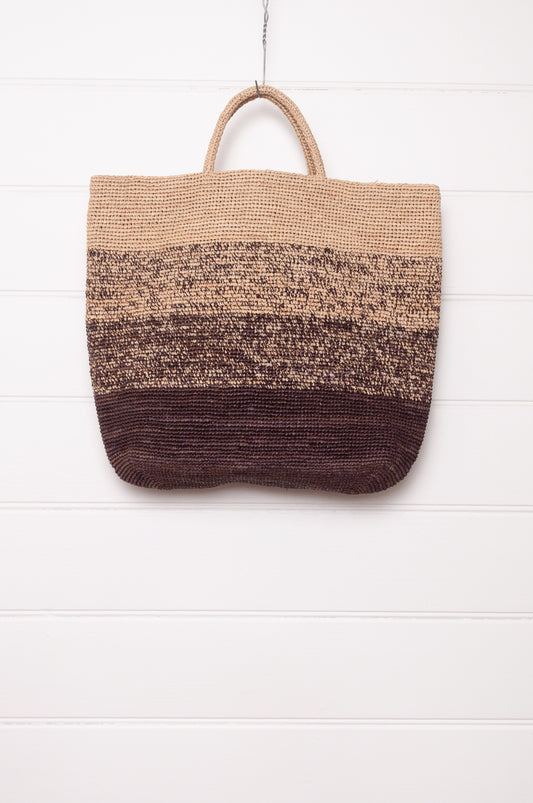 Sophie Digard crochet raffia shopper tote bag in gradient stripes from dark mole brown to natural flax.