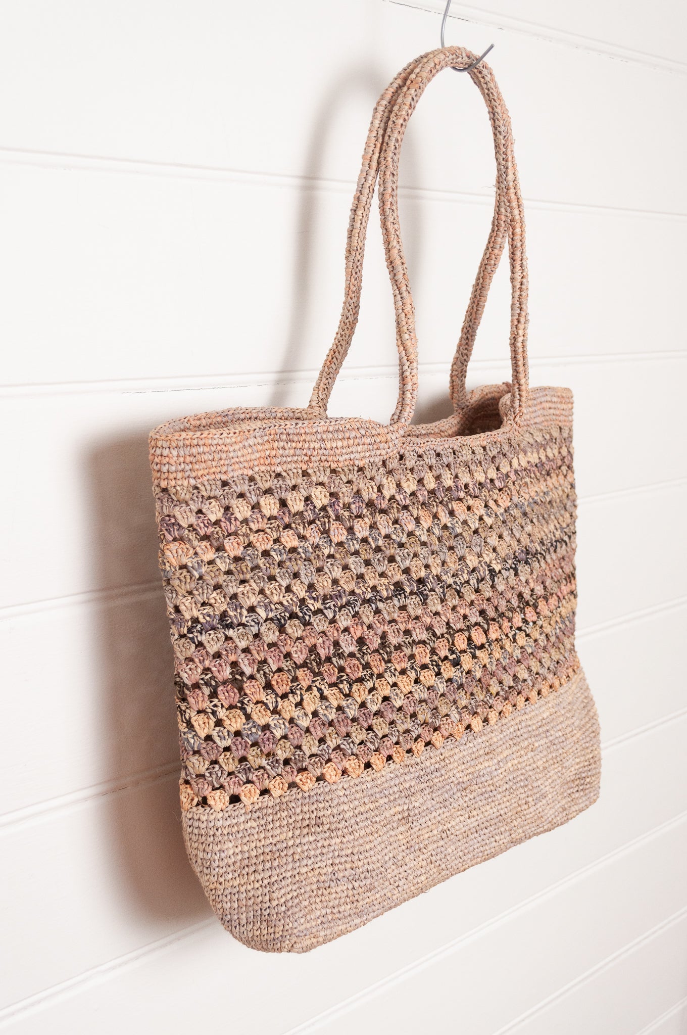 Sophie Digard crochet raffia bag in natural flax with soft multi-coloured stripe panel.