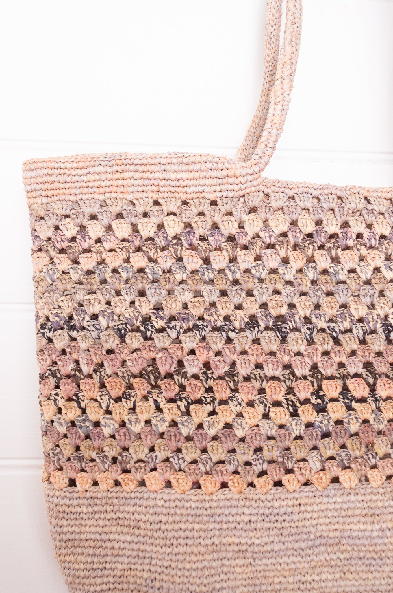 Sophie Digard crochet raffia bag in natural flax with soft multi-coloured stripe panel.