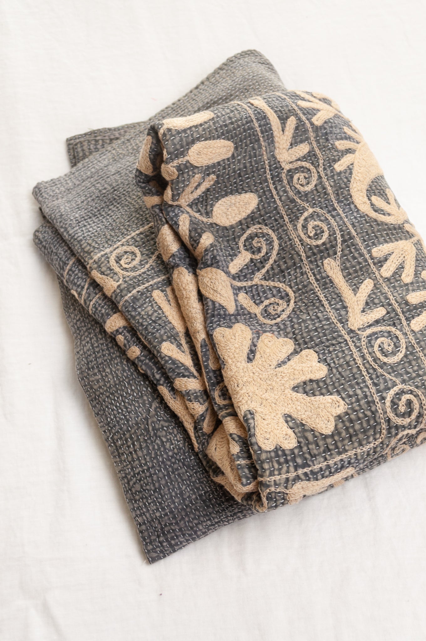 Suzani embroidered vintage kantha quilt floral design in pewter grey with vanilla cream embroidery.