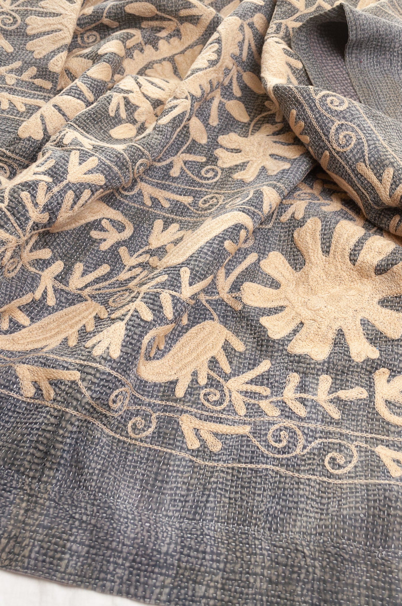 Suzani embroidered vintage kantha quilt floral design in pewter grey with vanilla cream embroidery.