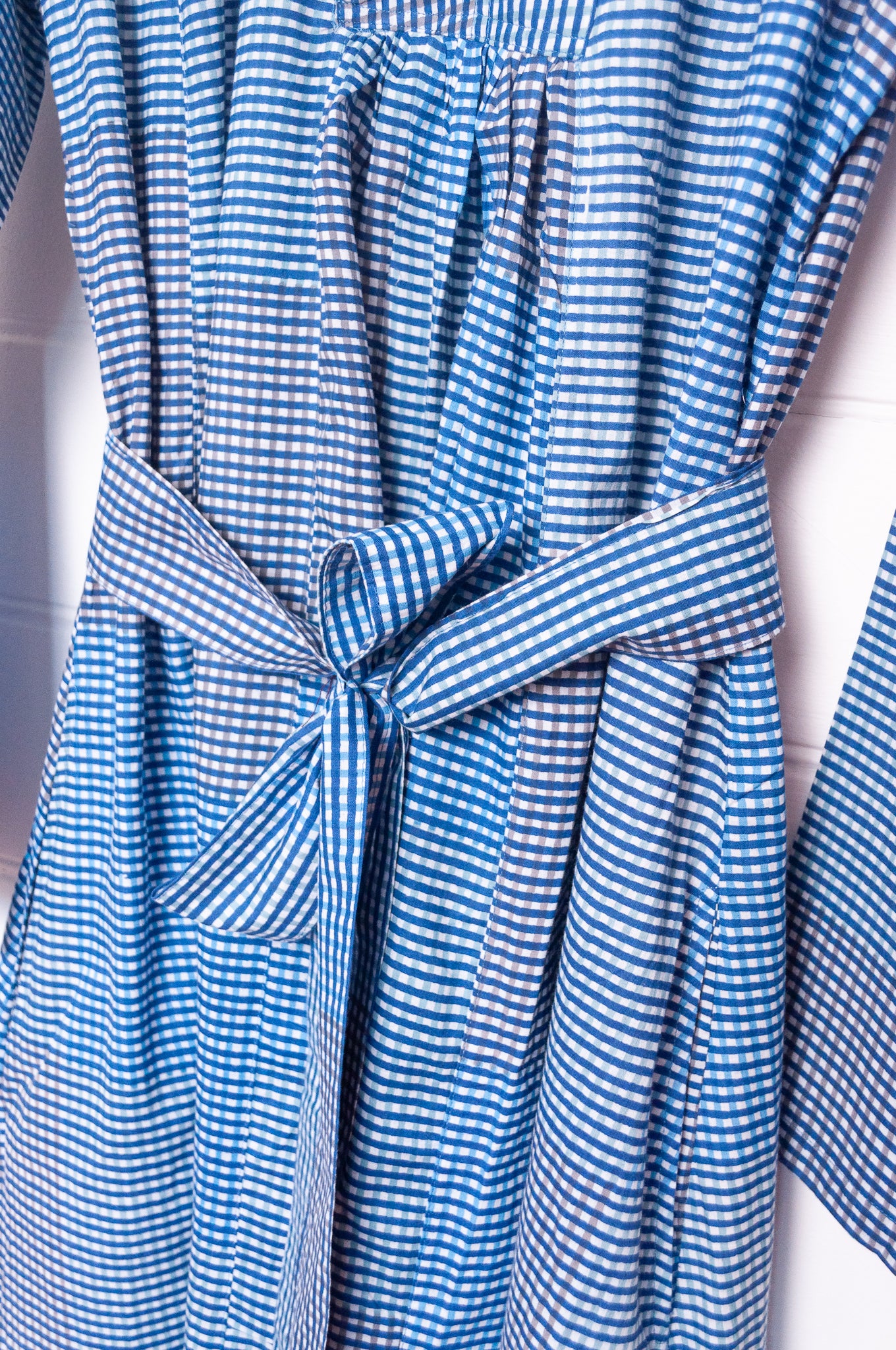 Multi-check long sleeved maxi tunic cotton dress in shades of blue and grey.