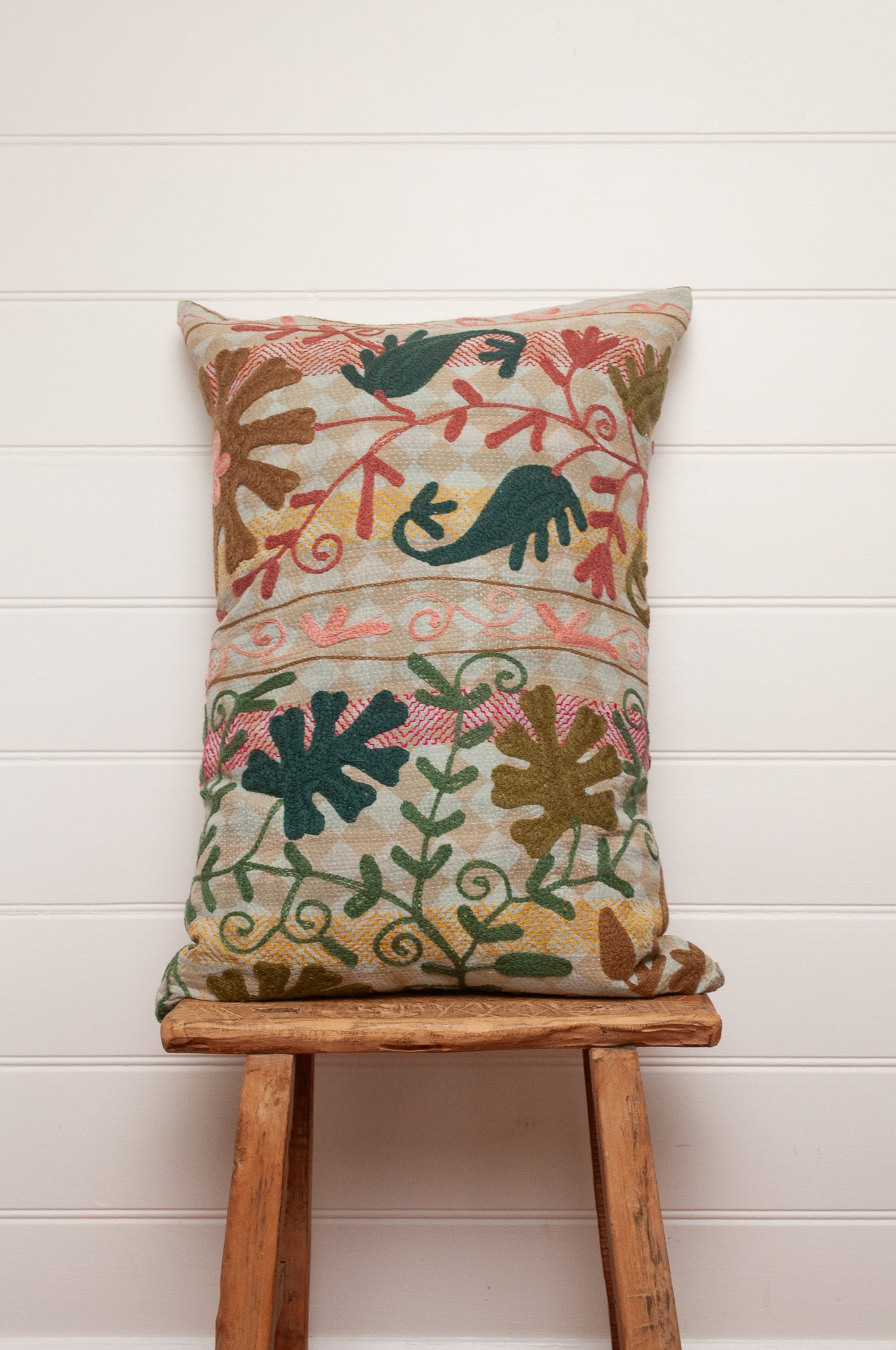 Suzani embroidered vintage kantha bolster cushion floral in mustard, teal green and rust.