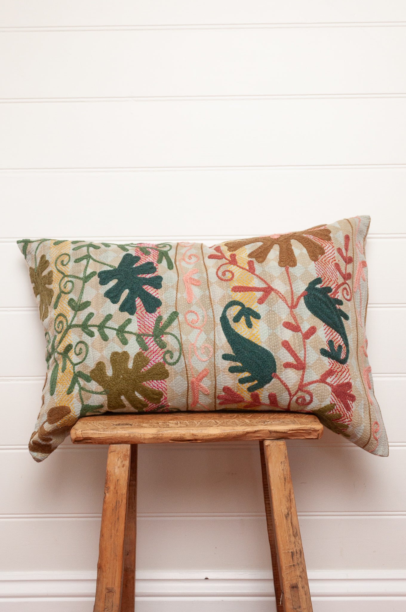Suzani embroidered vintage kantha bolster cushion floral in mustard, teal green and rust.