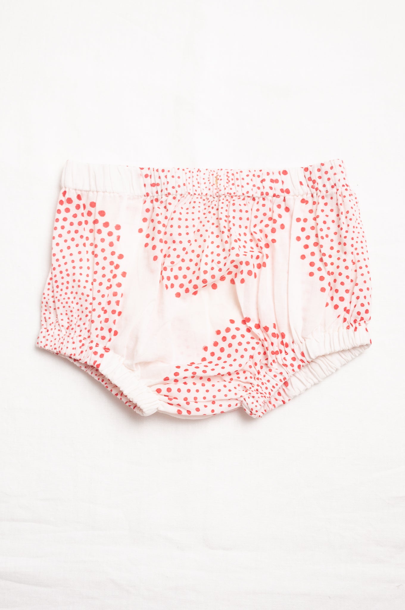 Juni Kids pure cotton blockprint baby toddler bloomers in red dot circle print on white.