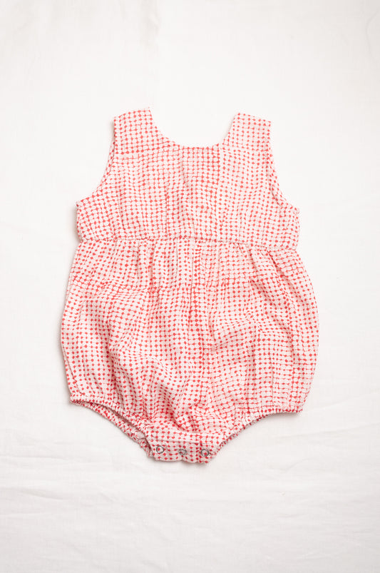 Juni Kids pure cotton blockprint baby romper in red dots on white.