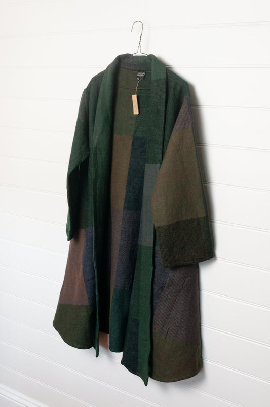 Neeru Kumar handwoven wool cardigan jacket coat in multicolor block pattern of browns and greens.