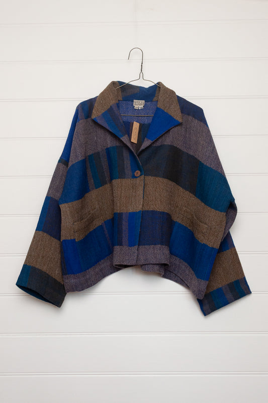 Neeru Kumar handwoven wool Coco jackt in block blanket checks in grey brown, cobalt, teal and navy.