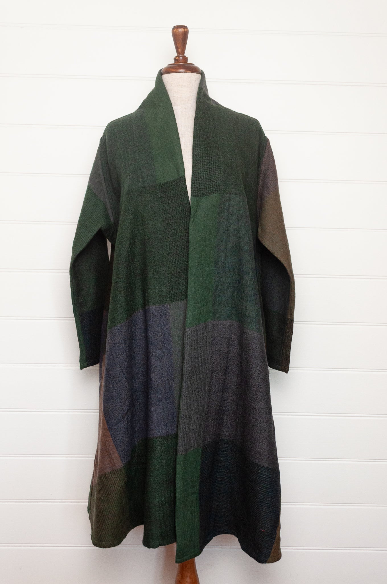 Neeru Kumar handwoven wool cardigan jacket coat in multicolor block pattern of browns and greens.