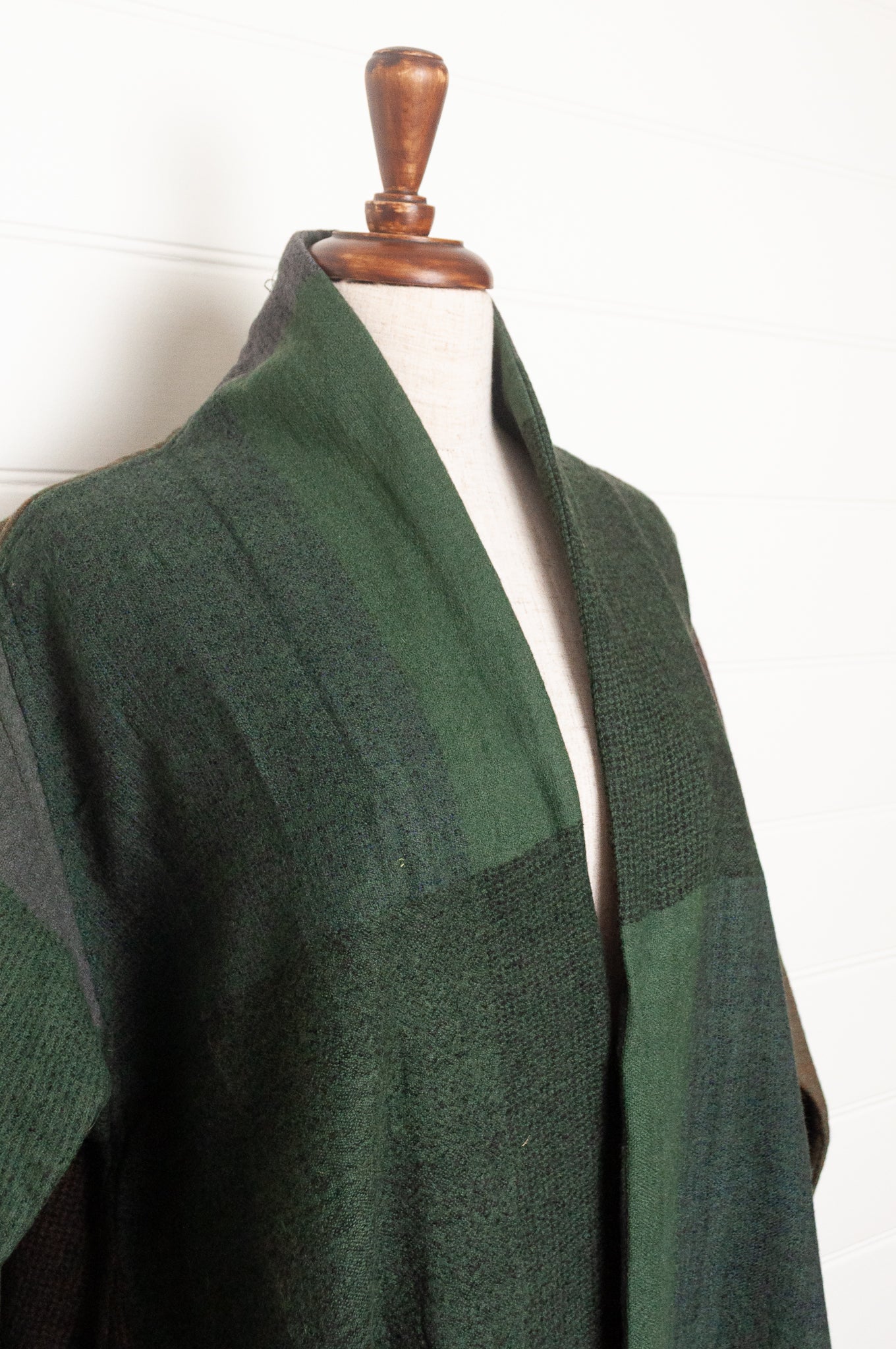 Neeru Kumar handwoven wool cardigan jacket coat in multicolor block pattern of browns and greens.