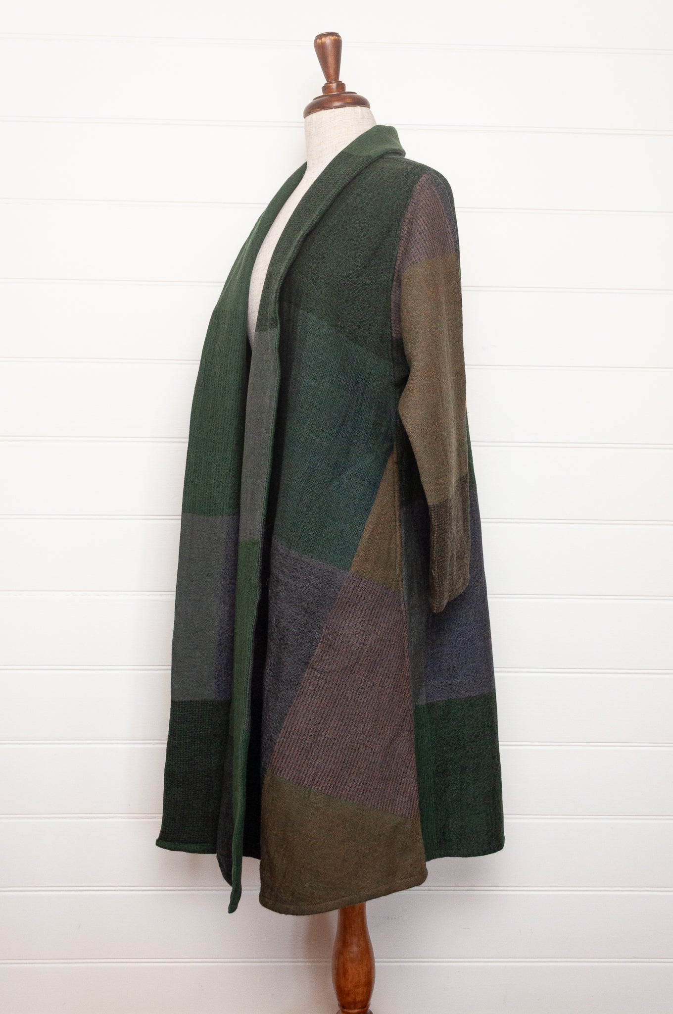 Neeru Kumar handwoven wool cardigan jacket coat in multicolor block pattern of browns and greens.