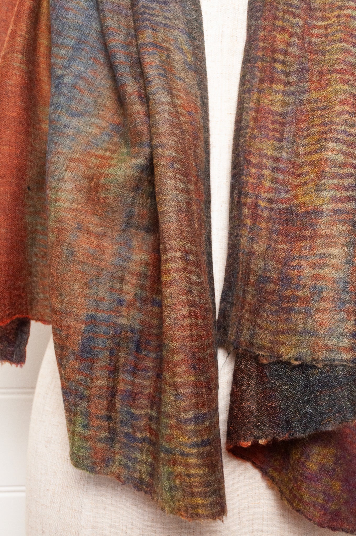 Neeru Kumar fine wool scarf digital print in abstract design with tones of rust, blue, charcoal and brown.