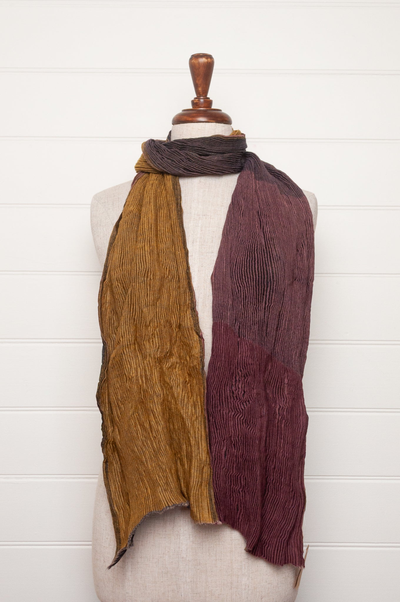 Neeru Kumar pure wool shibori dyed crinkle pleat finish scarf in mustard yellow, ginger brown and dusty lavender.